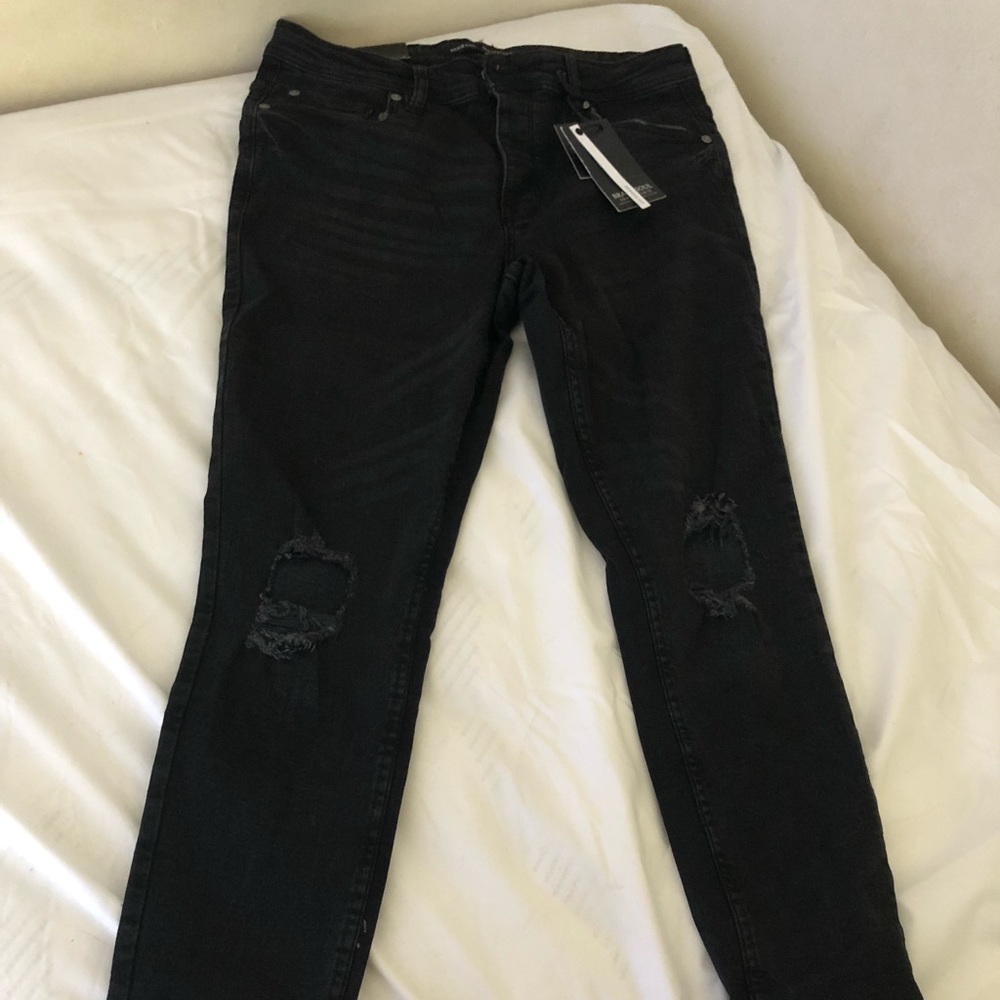 Black distressed jeans size 32
